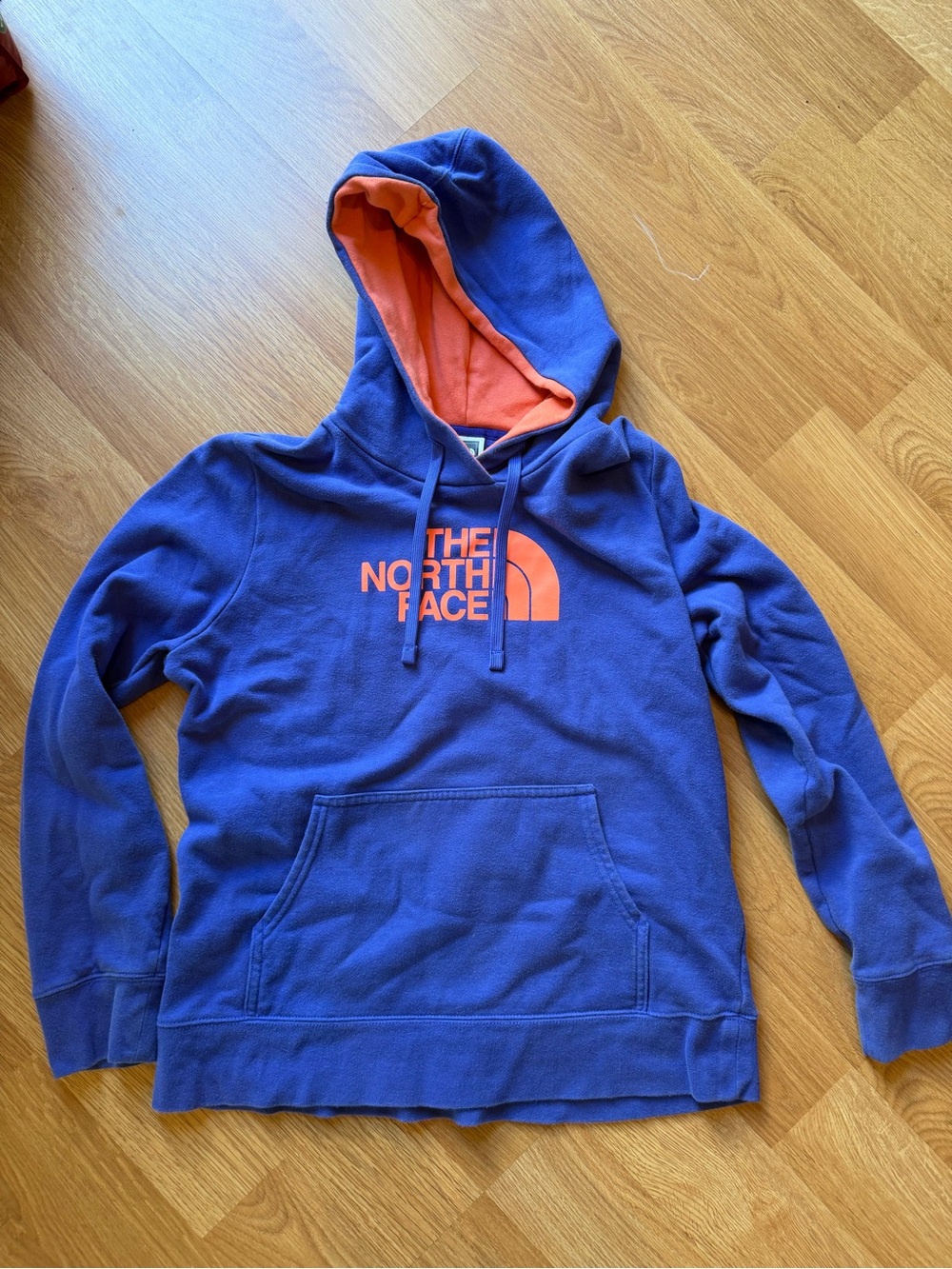 The North Face Royal Blue Hoodie with Orange Logo